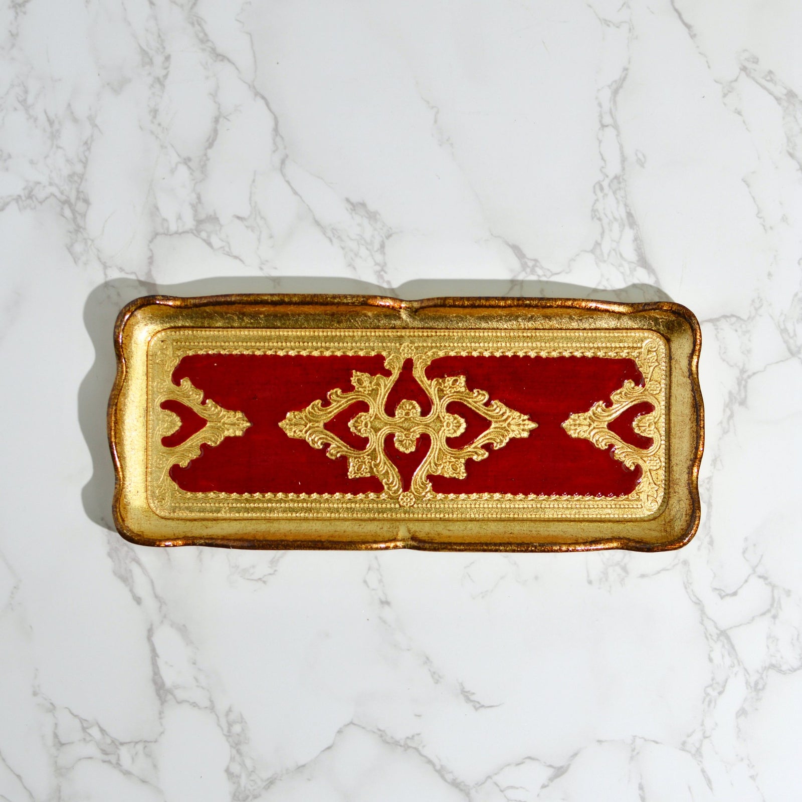 Close-up of a Florentine carved gilded wood decorative tray from Italy, showcasing intricate details and elegant craftsmanship.