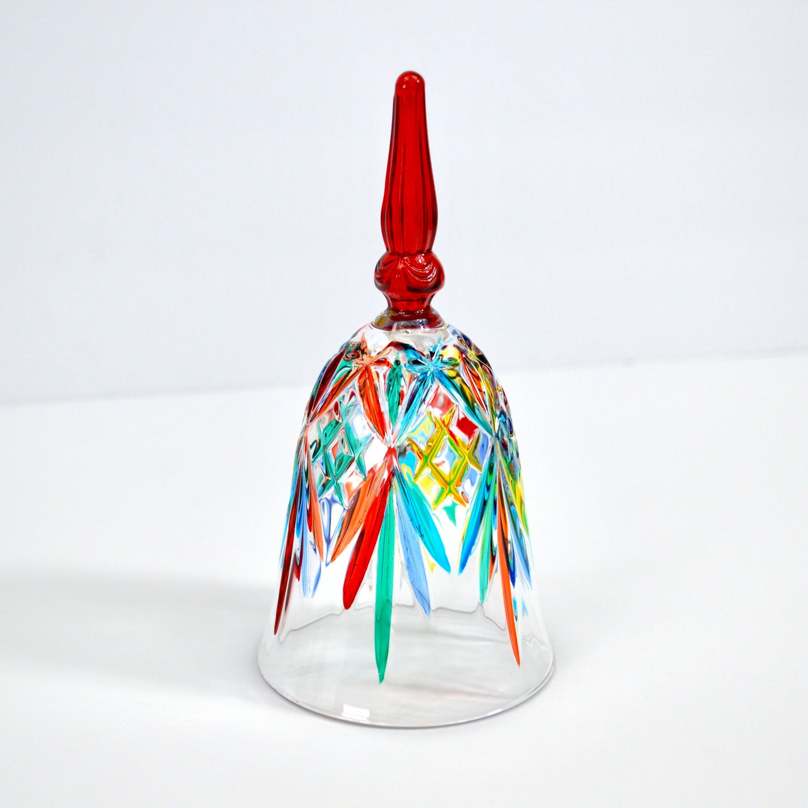DZ hand-painted Italian crystal bell with a blue handle, showcasing intricate craftsmanship and elegant glass details.