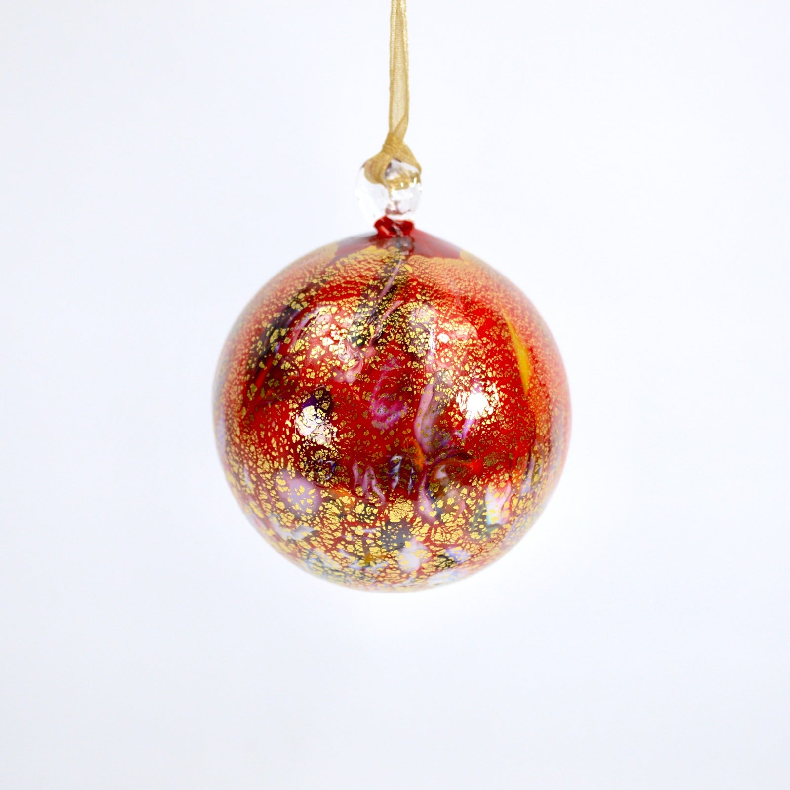 Colorful Murano glass holiday ornament with macchia accents, handcrafted in Italy, perfect for festive decorations.