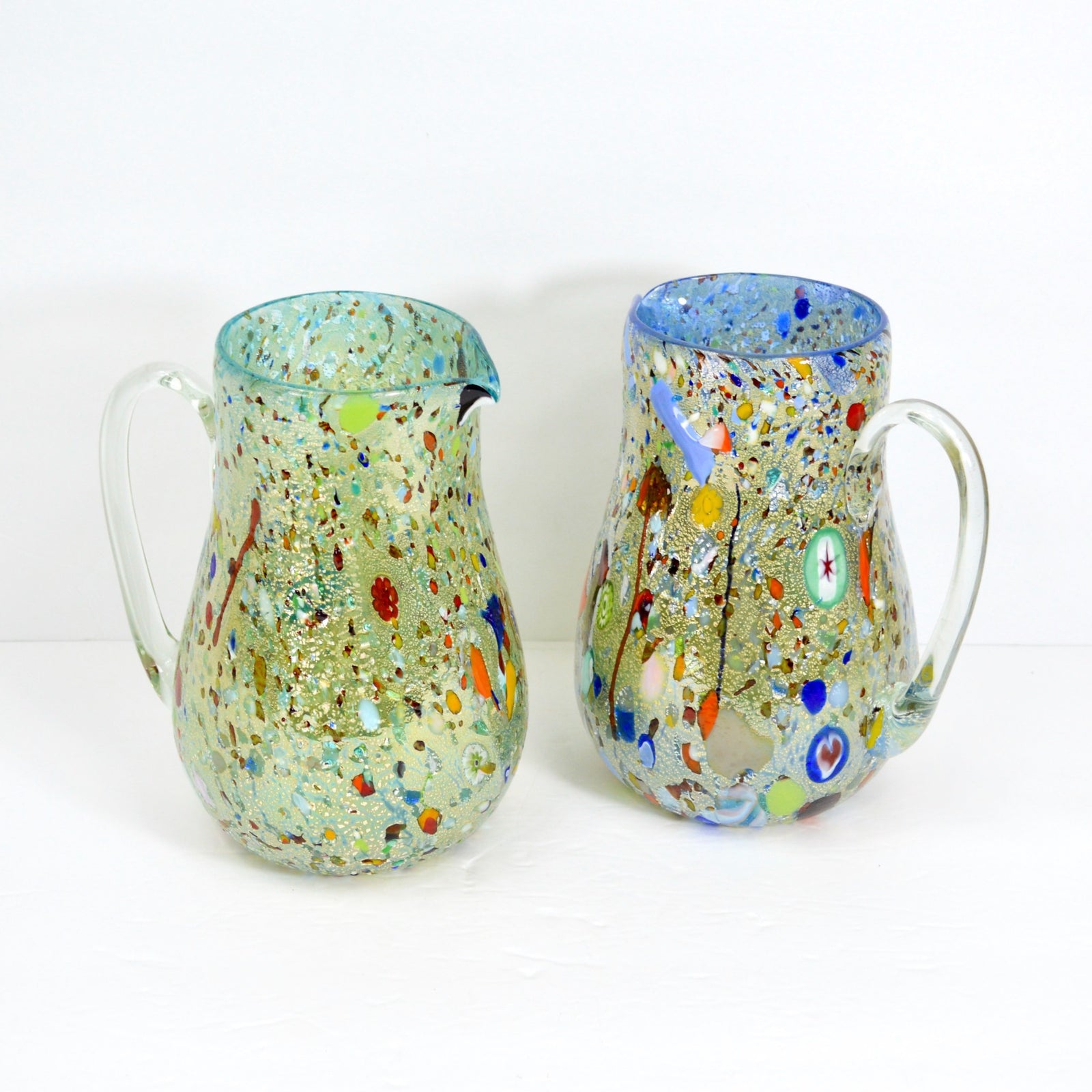 Cobalt blue Murano glass Alta round drink pitcher with millefiori design, part of serving pitchers and carafes collection.