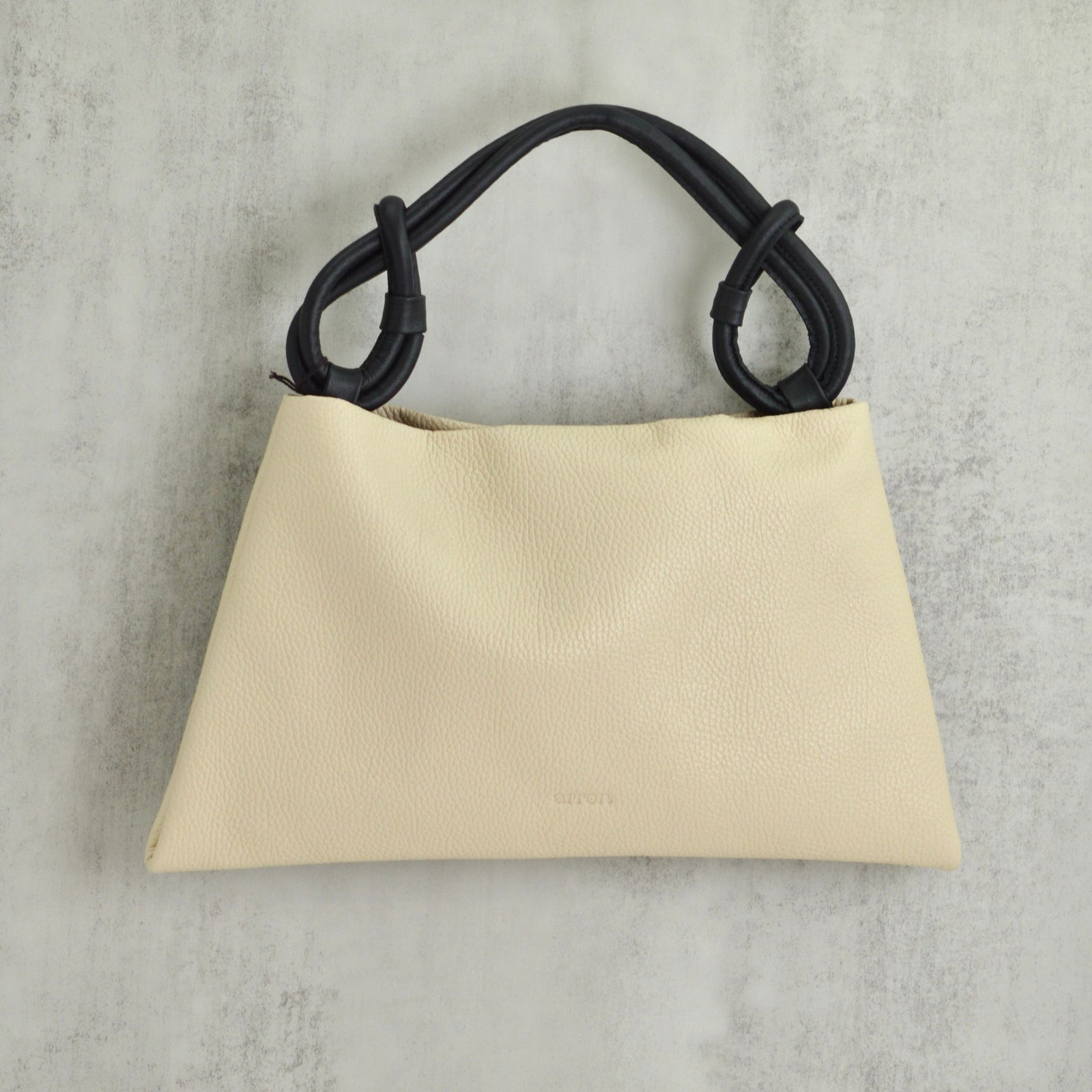 Small teal Poppy Hobo Bag by MyItalianDecor, crafted from Italian leather, featuring a stylish and compact handbag design.
