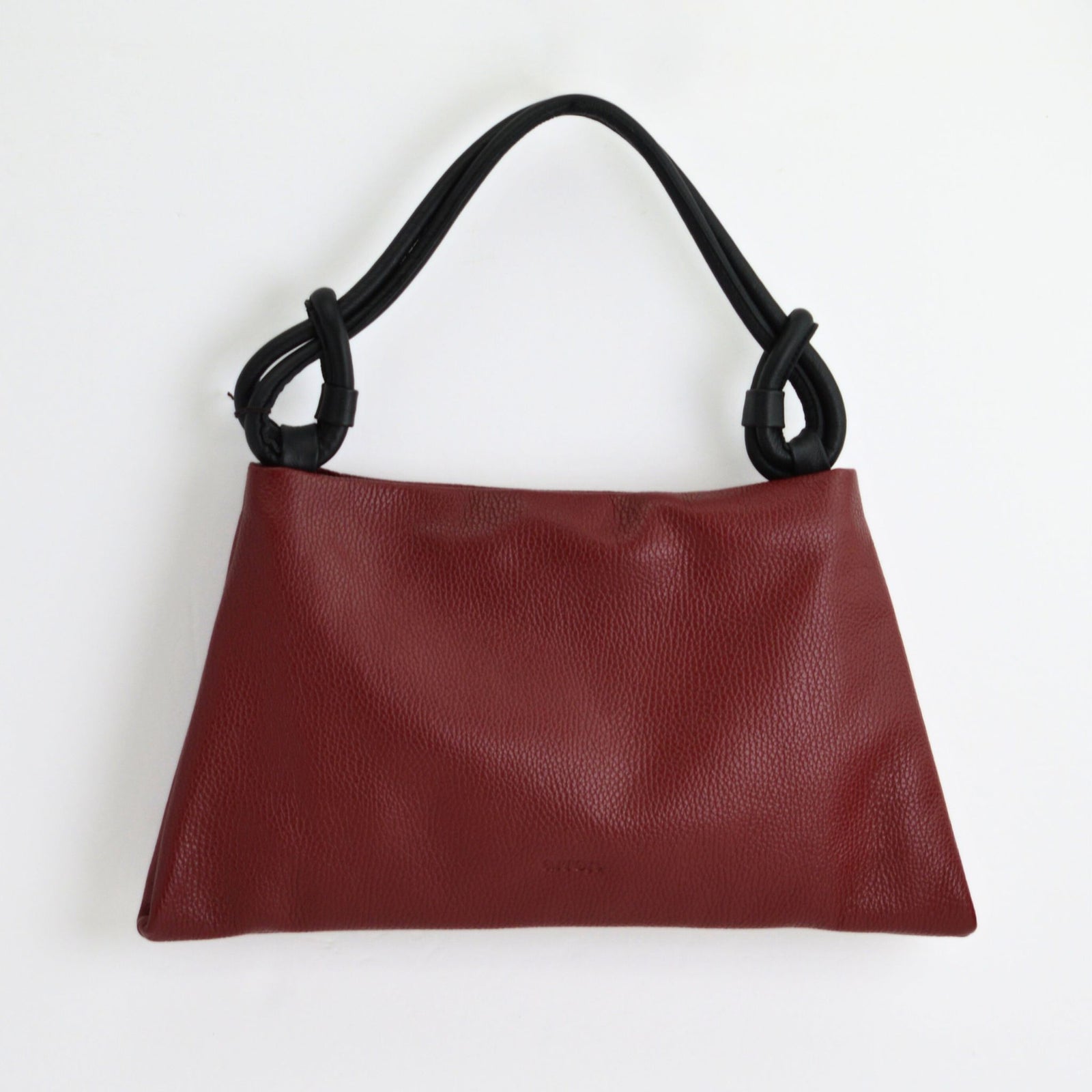 Small teal Poppy Hobo Bag by MyItalianDecor, crafted from Italian leather, featuring a stylish and compact handbag design.