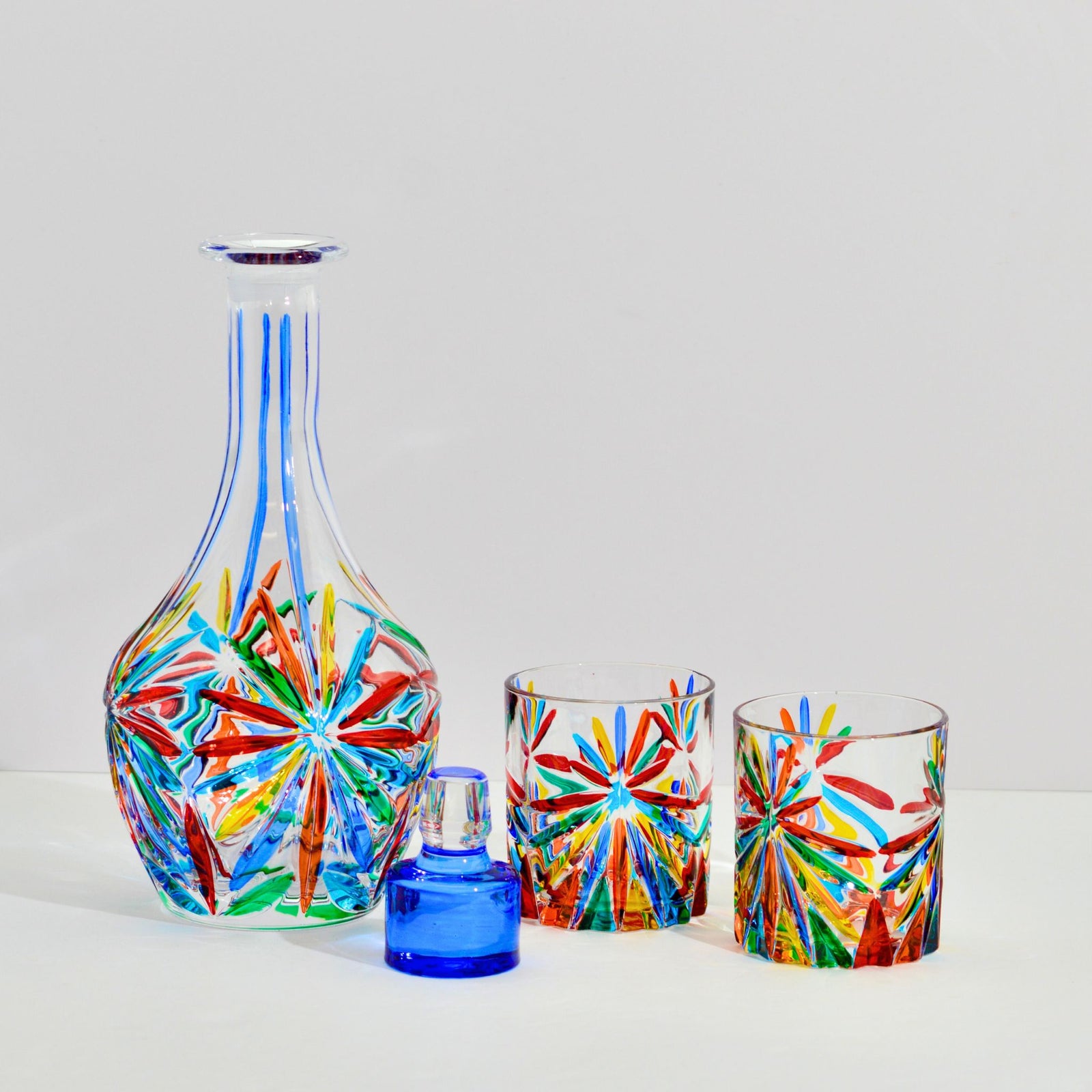 Hand-painted crystal Starburst Round Decanter by DZ, made in Italy, showcasing intricate design and elegant craftsmanship.