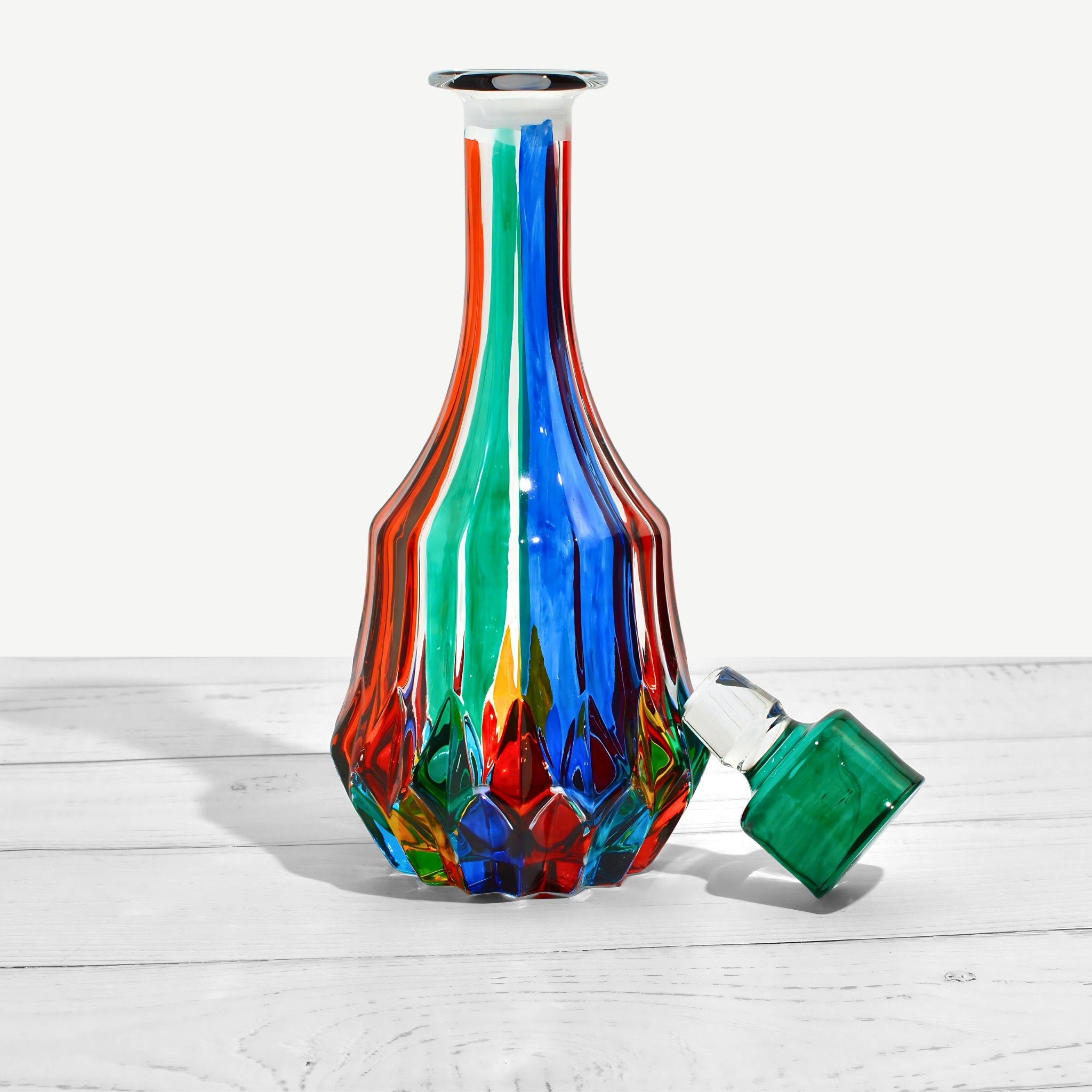 Round Swatch decanter by MyItalianDecor with a hand-painted Italian crystal stopper, elegant and decorative for fine spirits.