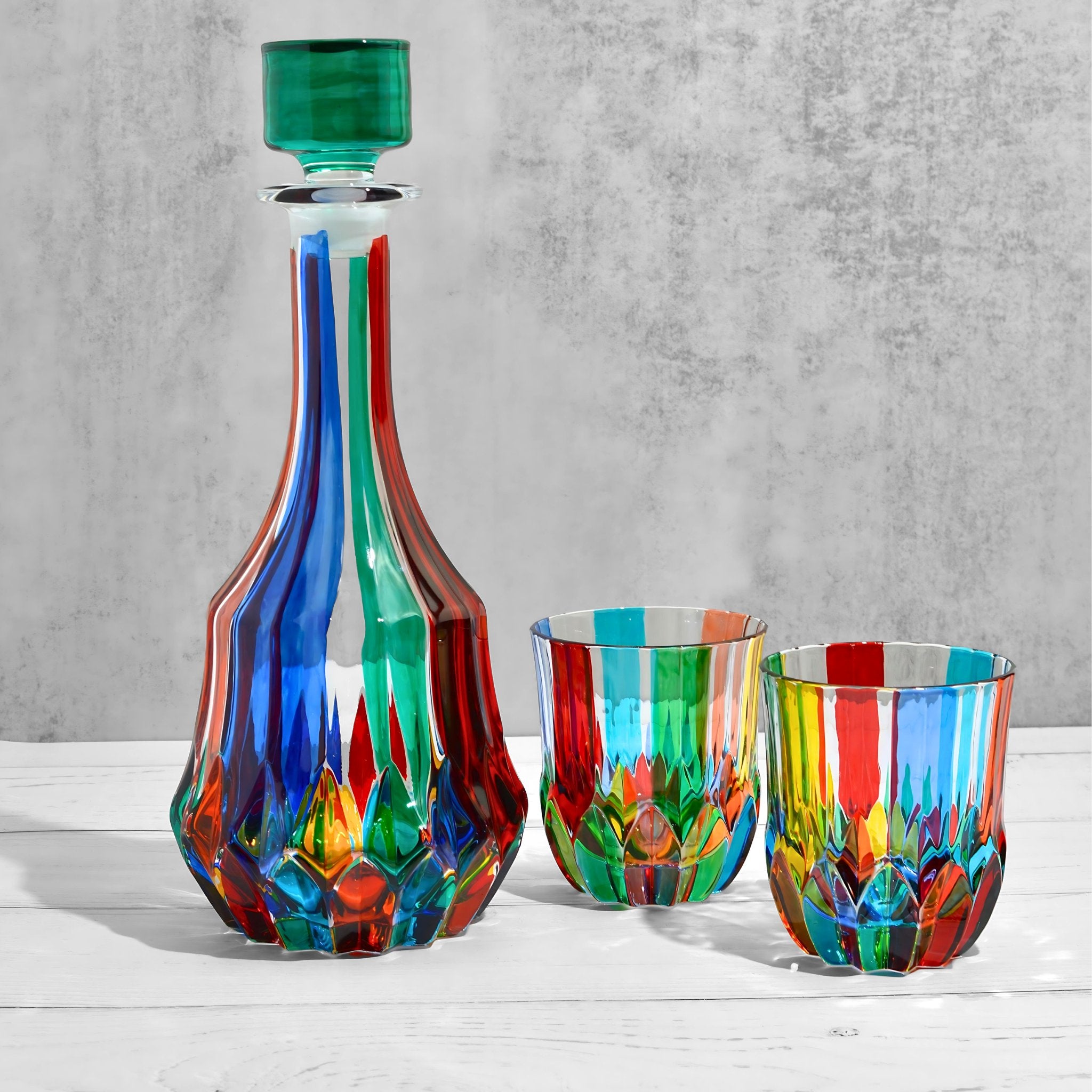 Hand-painted Italian crystal Swatch round decanter with matching short glasses, elegant and decorative for fine drink presentation.