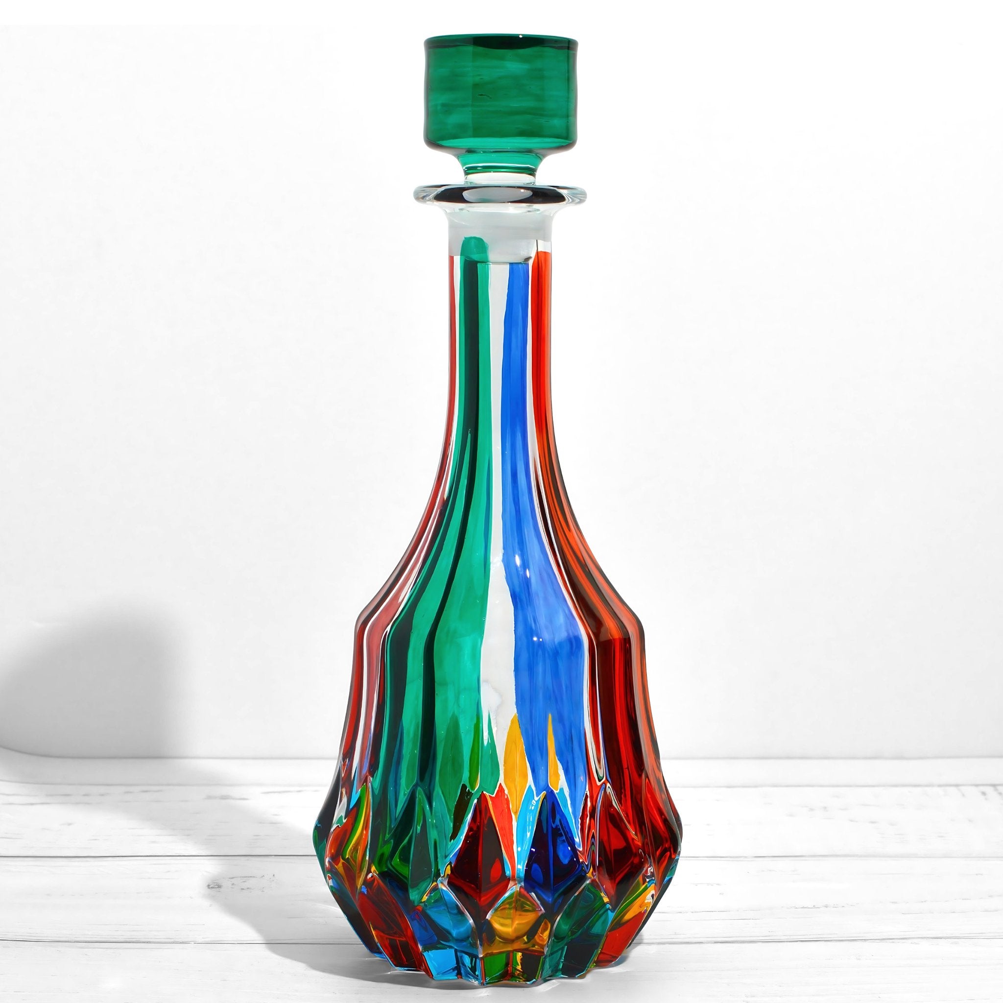 Hand-painted Italian crystal Swatch round decanter featuring intricate designs, elegant and perfect for showcasing fine spirits.
