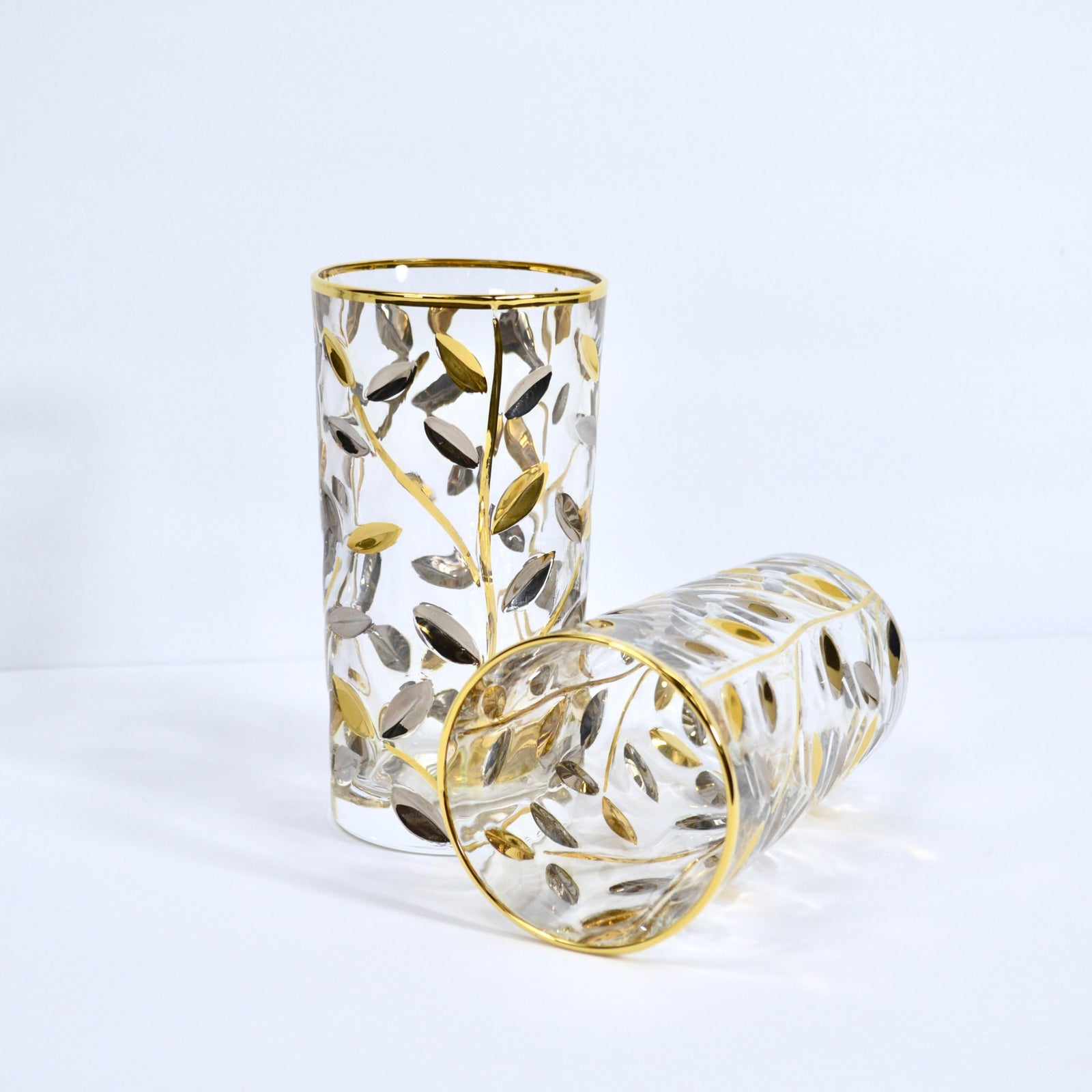 DZ Flowervine platinum and gold Italian crystal tall tumblers, set of 2, featuring elegant glassware with gold accents on a white background.