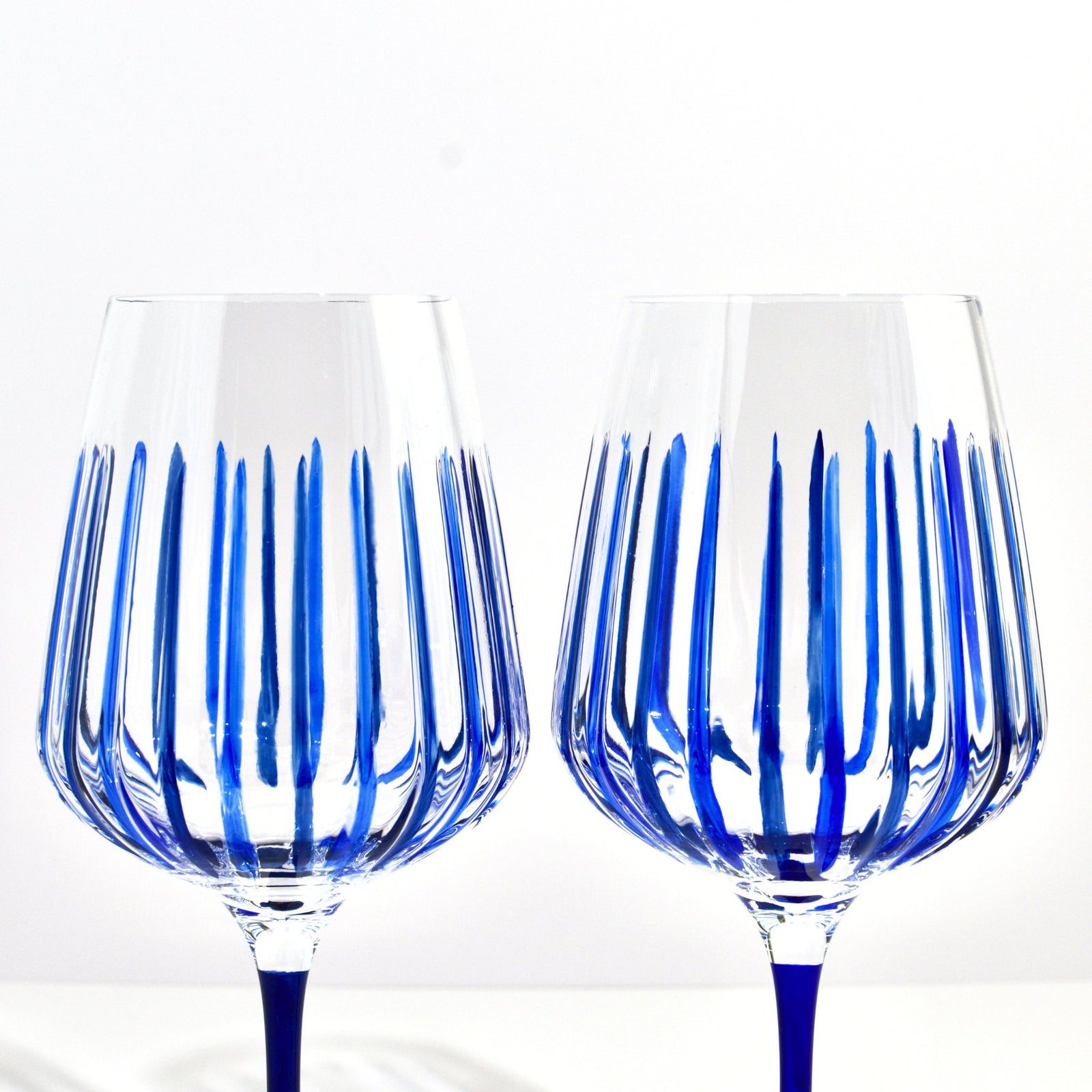 Set of 2 blue Spritz crystal wine glasses by DZ, made in Italy, featuring elegant design and clear, sparkling glass.