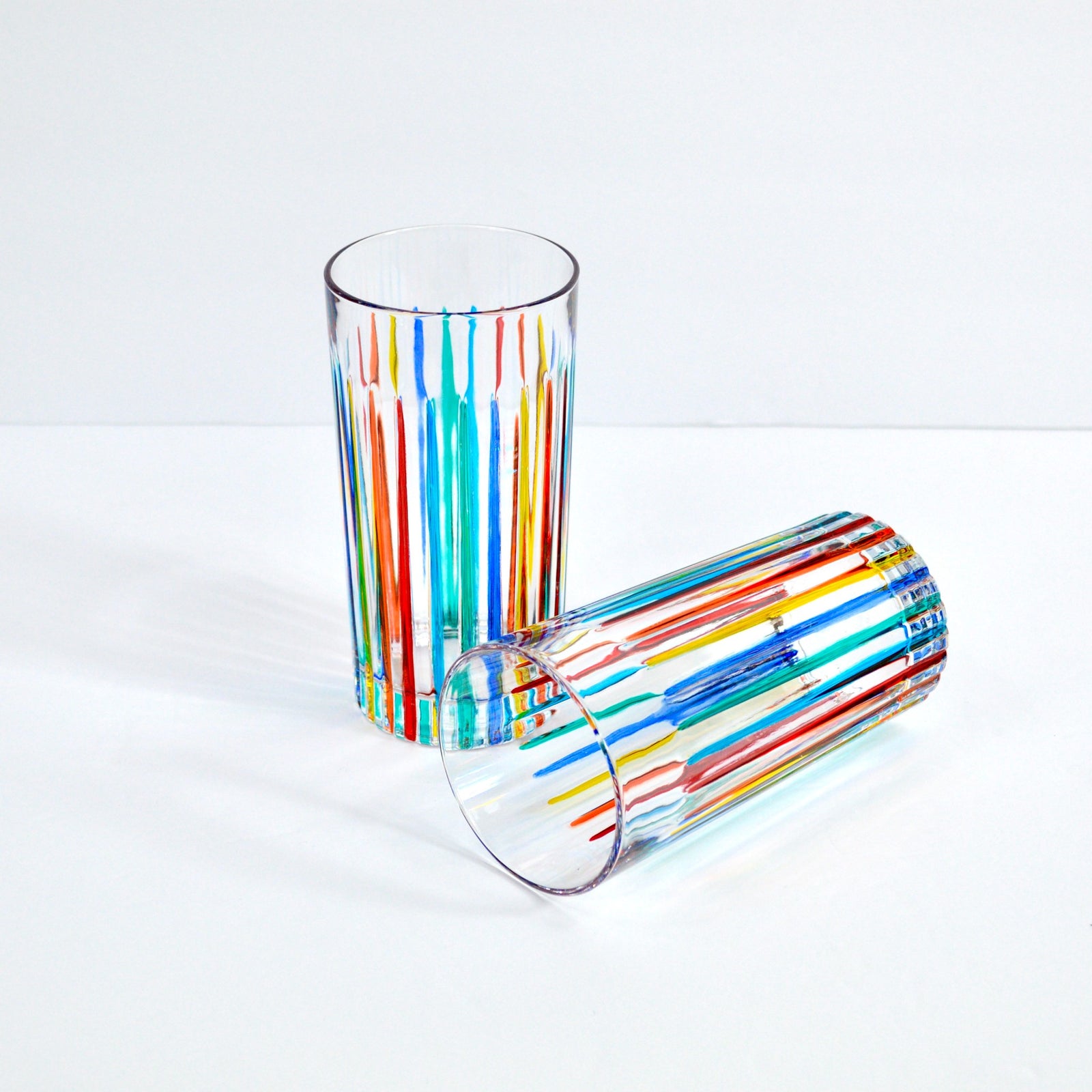 Set of two DZ Timeless Tall Drink Glass Tumblers made of Italian crystal, clear and elegant for serving beverages.