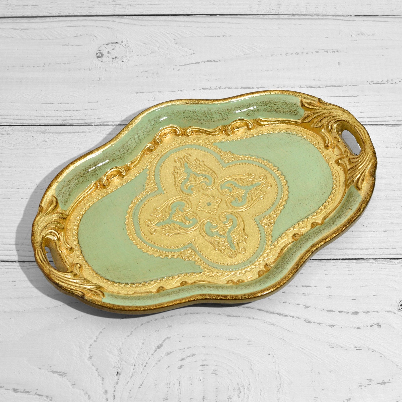 Small Florentine wood oval tray with handles, decorative tray by My Italian Decor, viewed from the top showcasing its design.