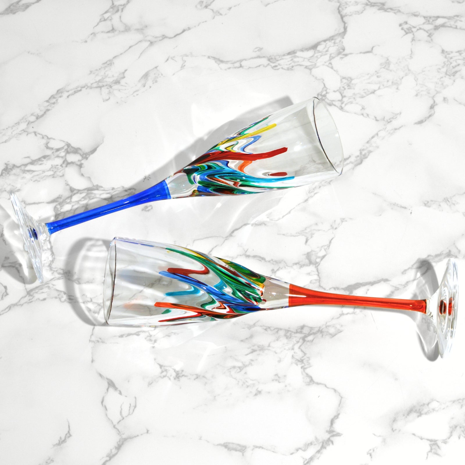 Set of 2 Trix champagne glasses by DZ, hand-painted Italian crystal champagne flutes with elegant design and clear crystal sparkle.