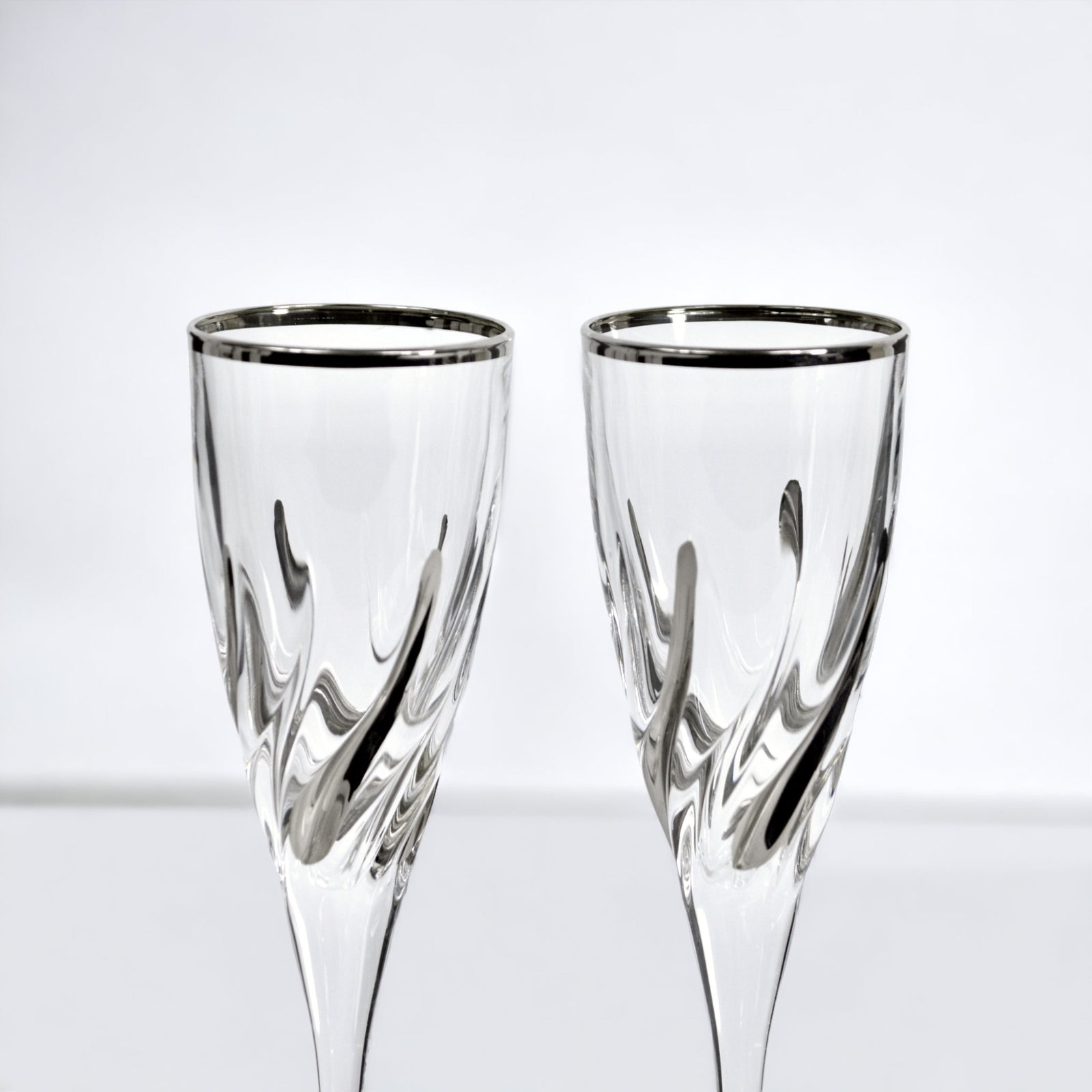 Set of two Trix Italian Crystal Platinum Champagne Glasses by DZ, elegant clear glass with a sleek stem and wide bowl for sparkling wine.