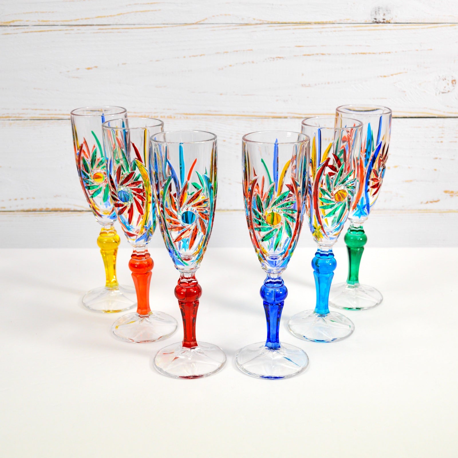 Set of two DZ Twizzler Italian crystal champagne glasses with elegant, clear design perfect for celebratory toasts.