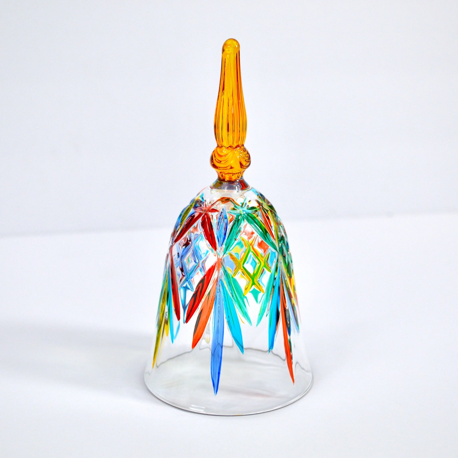 DZ hand-painted Italian crystal bell with a blue handle, showcasing intricate craftsmanship and elegant glass details.