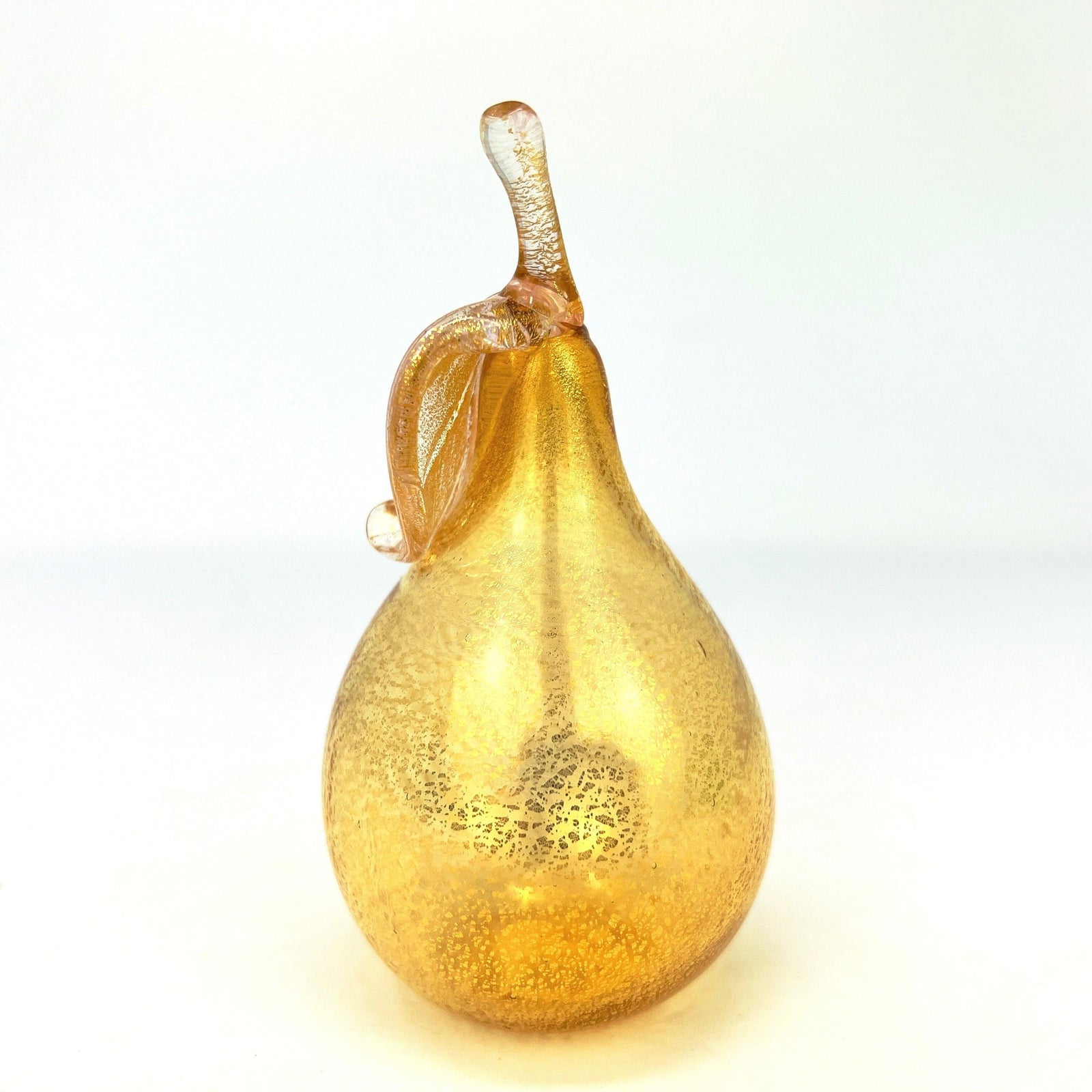 Three life-size Murano glass pears from MyItalianDecor, featuring vibrant blown glass fruit in realistic Italian art style.