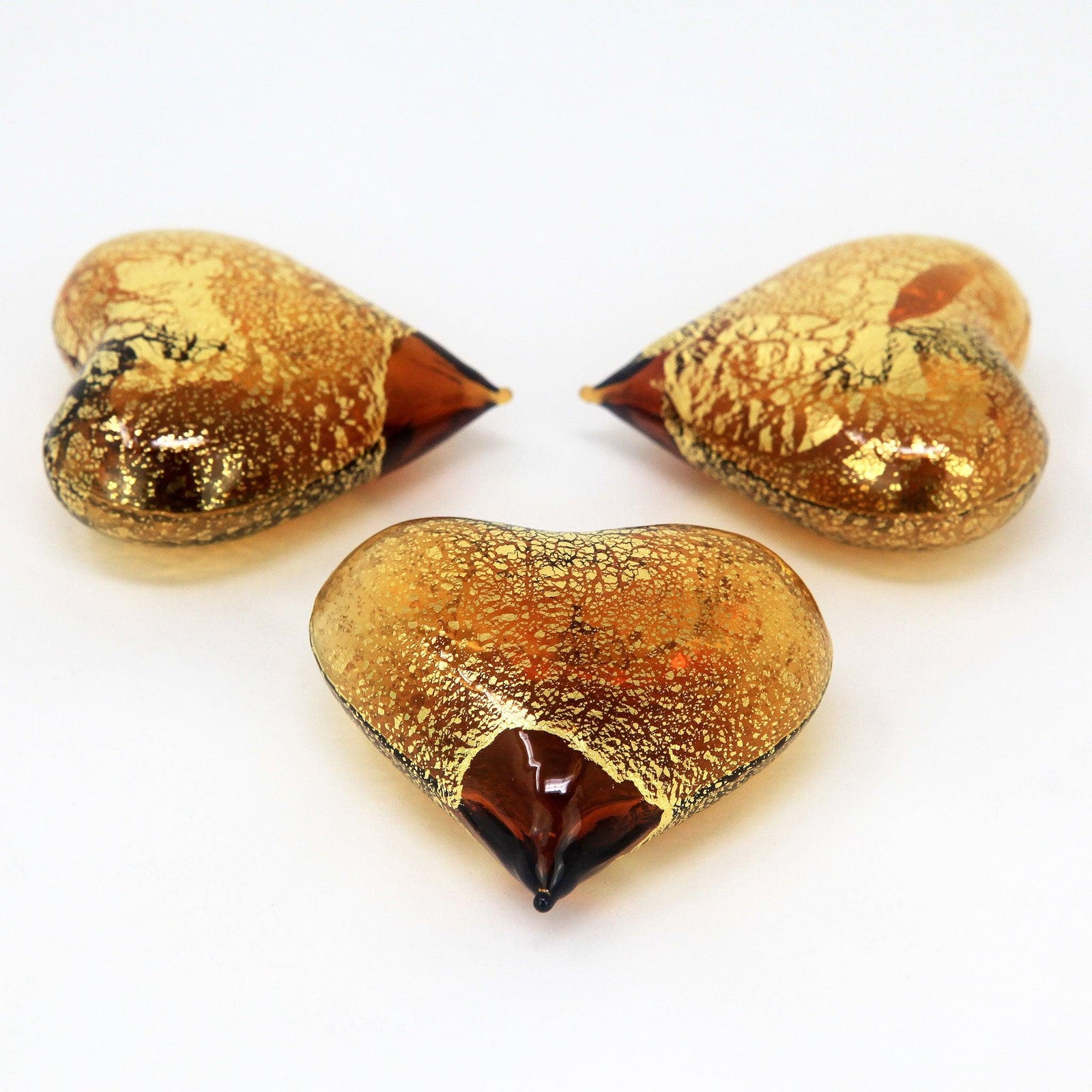 Set of three small Murano glass heart figurines in various colors, handcrafted in Italy by MyItalianDecor.