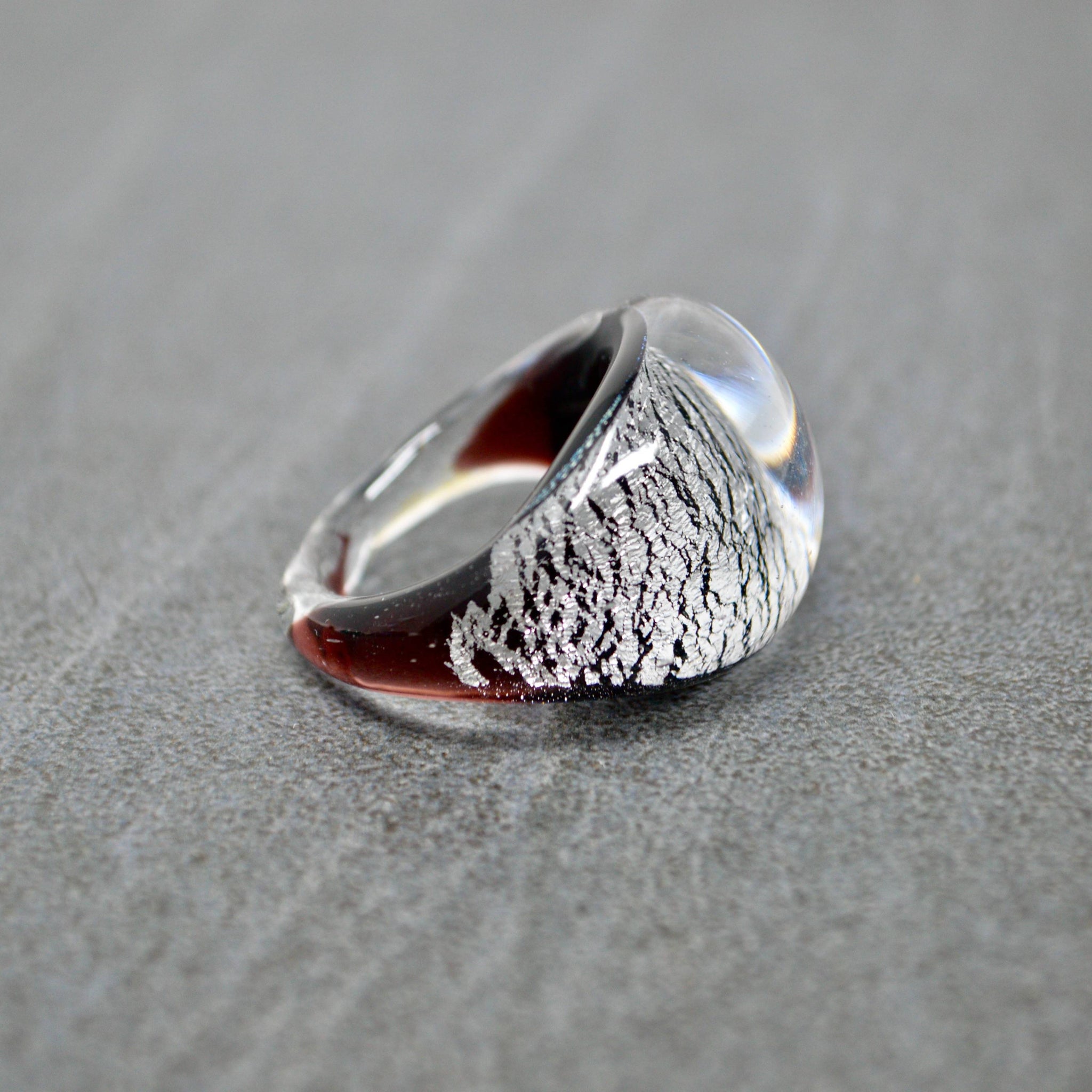 Close-up of Murano Glass Arno Statement Ring featuring cobalt, teal, and silver accents, made in Italy.