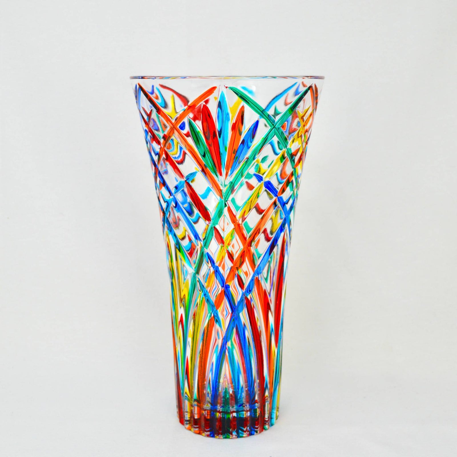 Large hand-painted crystal vase from DZ's Melodia Luxury collection, made in Italy, held in hands showcasing intricate design.