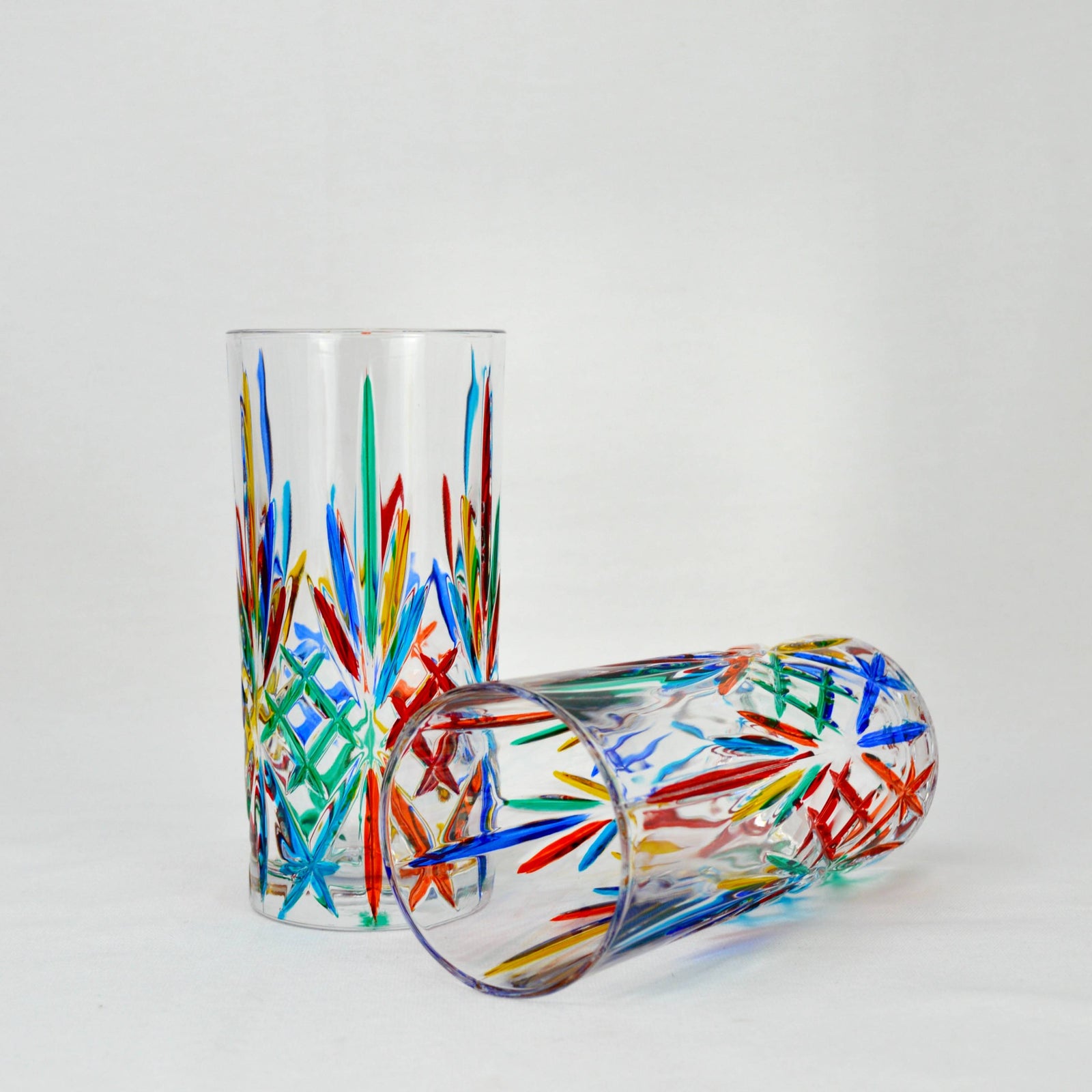 Set of two DZ Melodia tall drinking glasses, Italian-made tumblers with clear glass and elegant design.