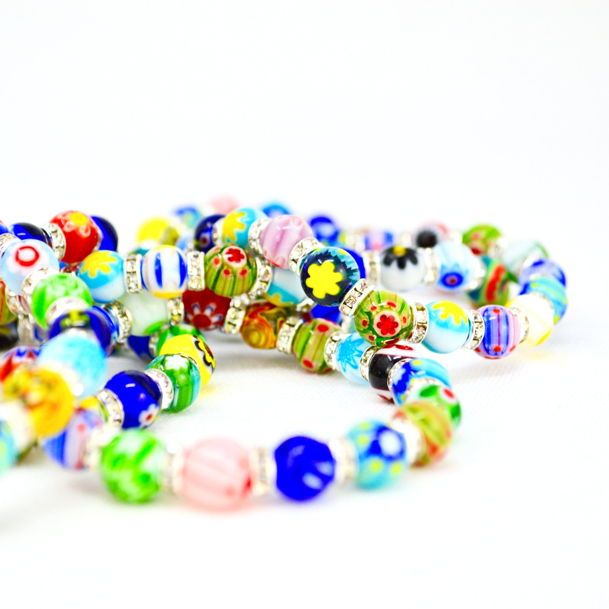 Colorful Murano glass Millefiori bead elastic bracelet with petite beads, made in Italy, by MyItalianDecor.