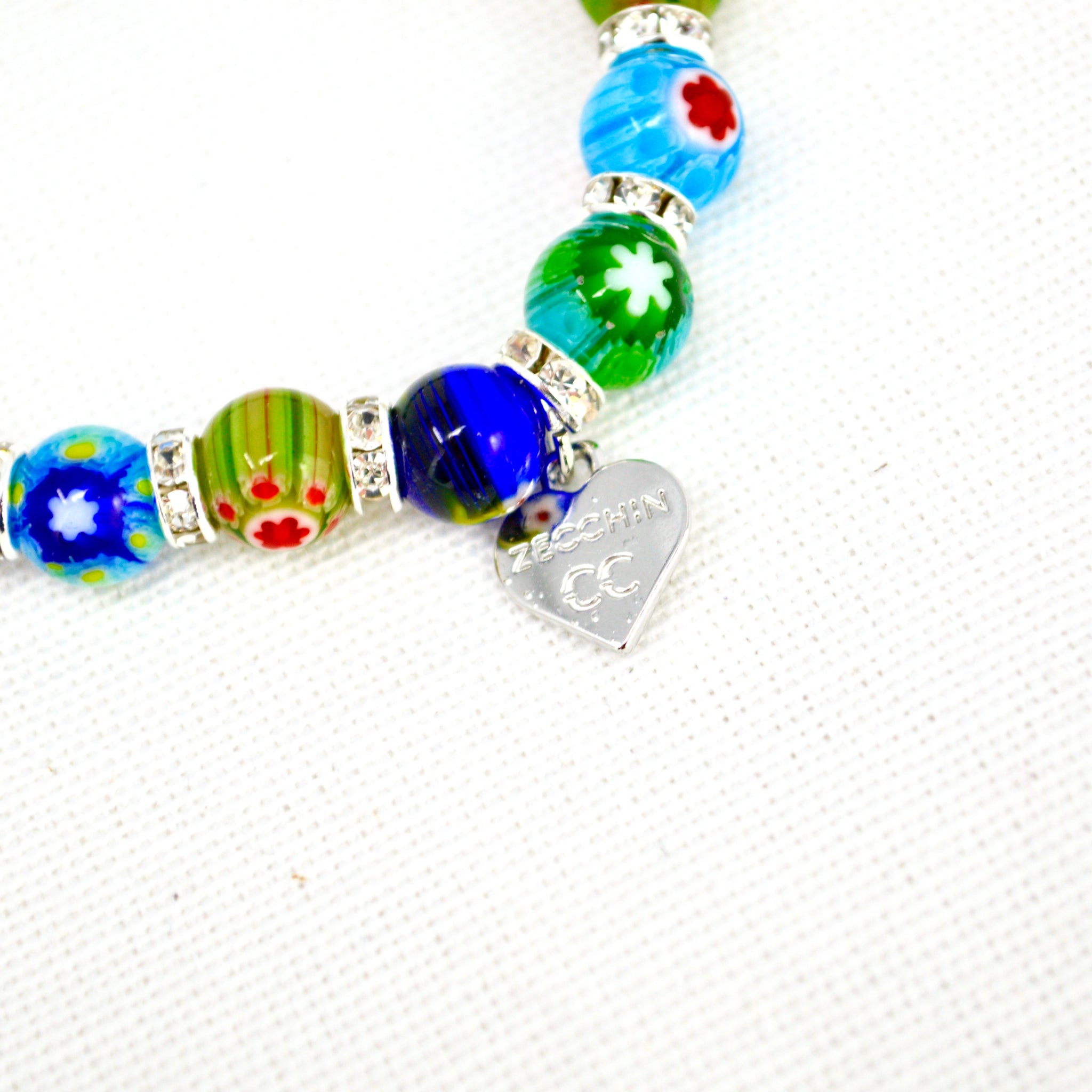 Close-up of Murano glass Millefiori bead elastic bracelet with colorful beads, made in Italy by MyItalianDecor.