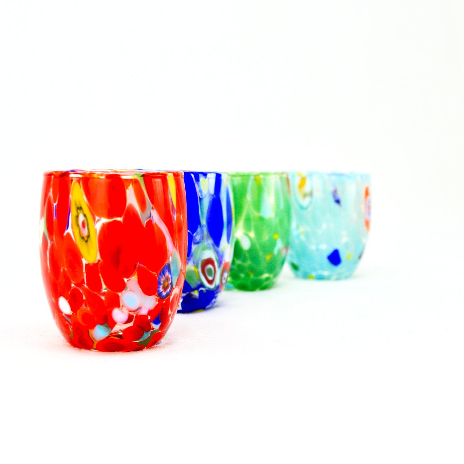 Set of four contemporary Murano glass shot glasses with millefiori design, made in Italy, by MyItalianDecor.