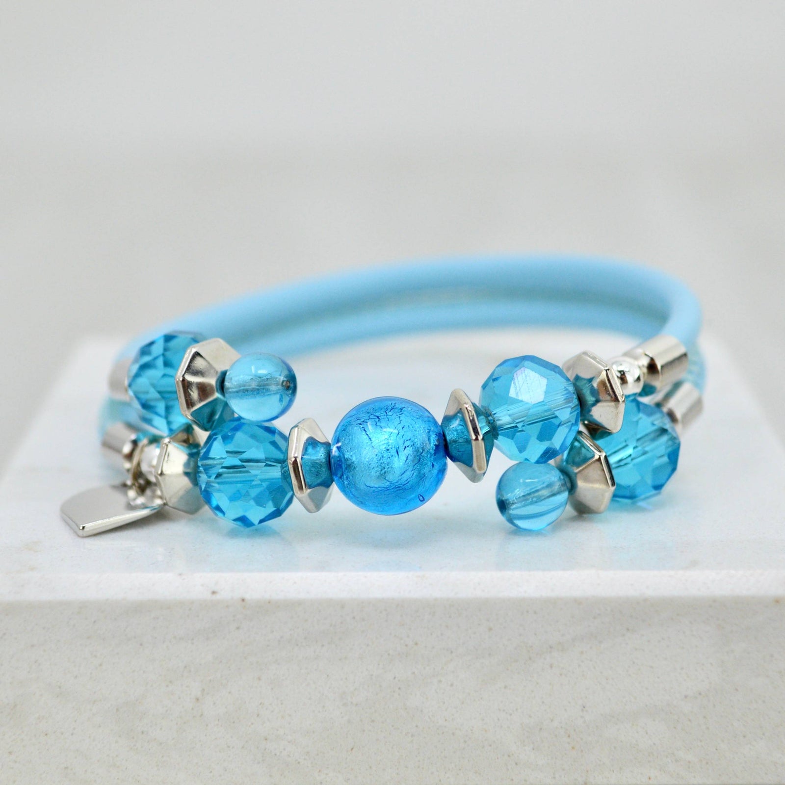 Colorful Murano Glass Rosella Beaded Bracelet by MyItalianDecor, showcasing vibrant glass beads from a top view.