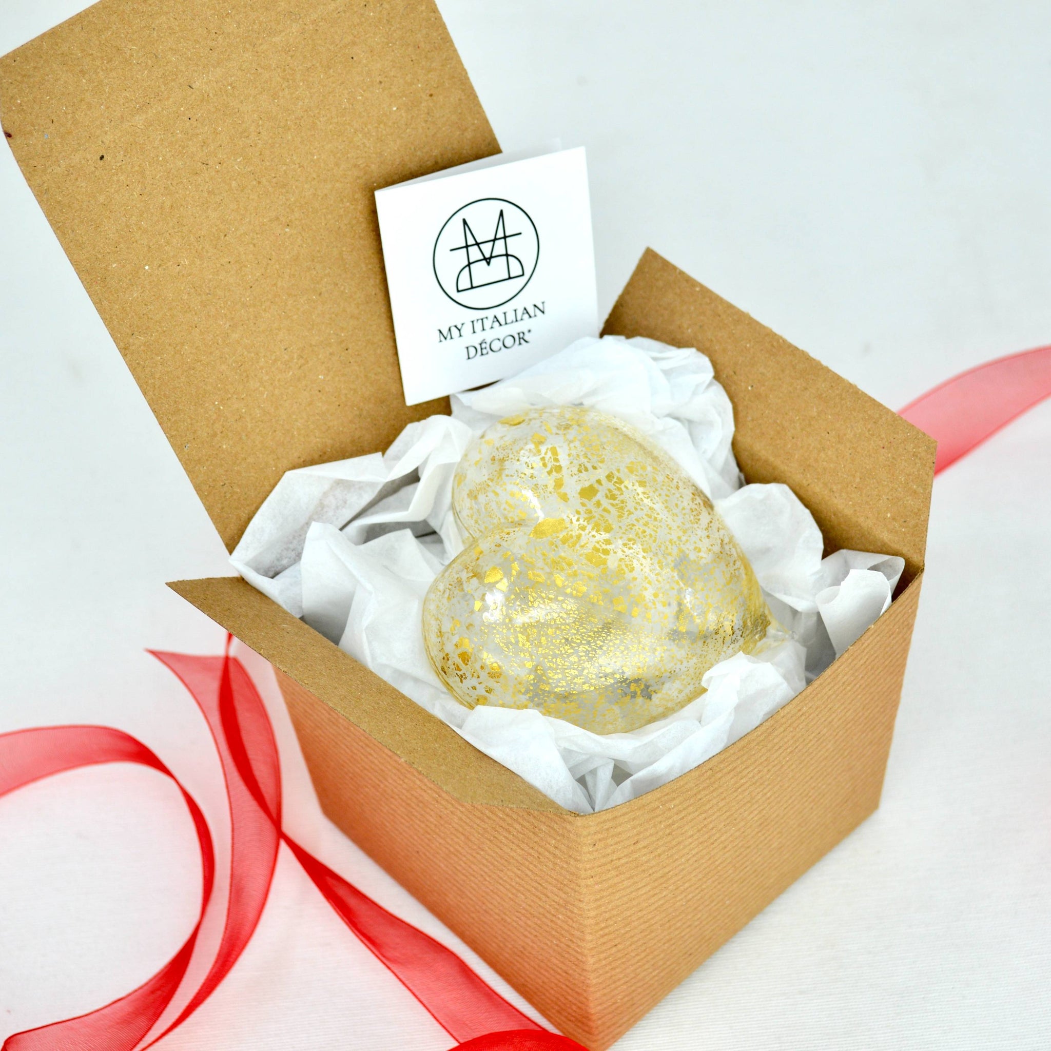 Colorful Murano glass heart figurine with 24 karat gold accents, handcrafted in Italy, presented in a decorative box.