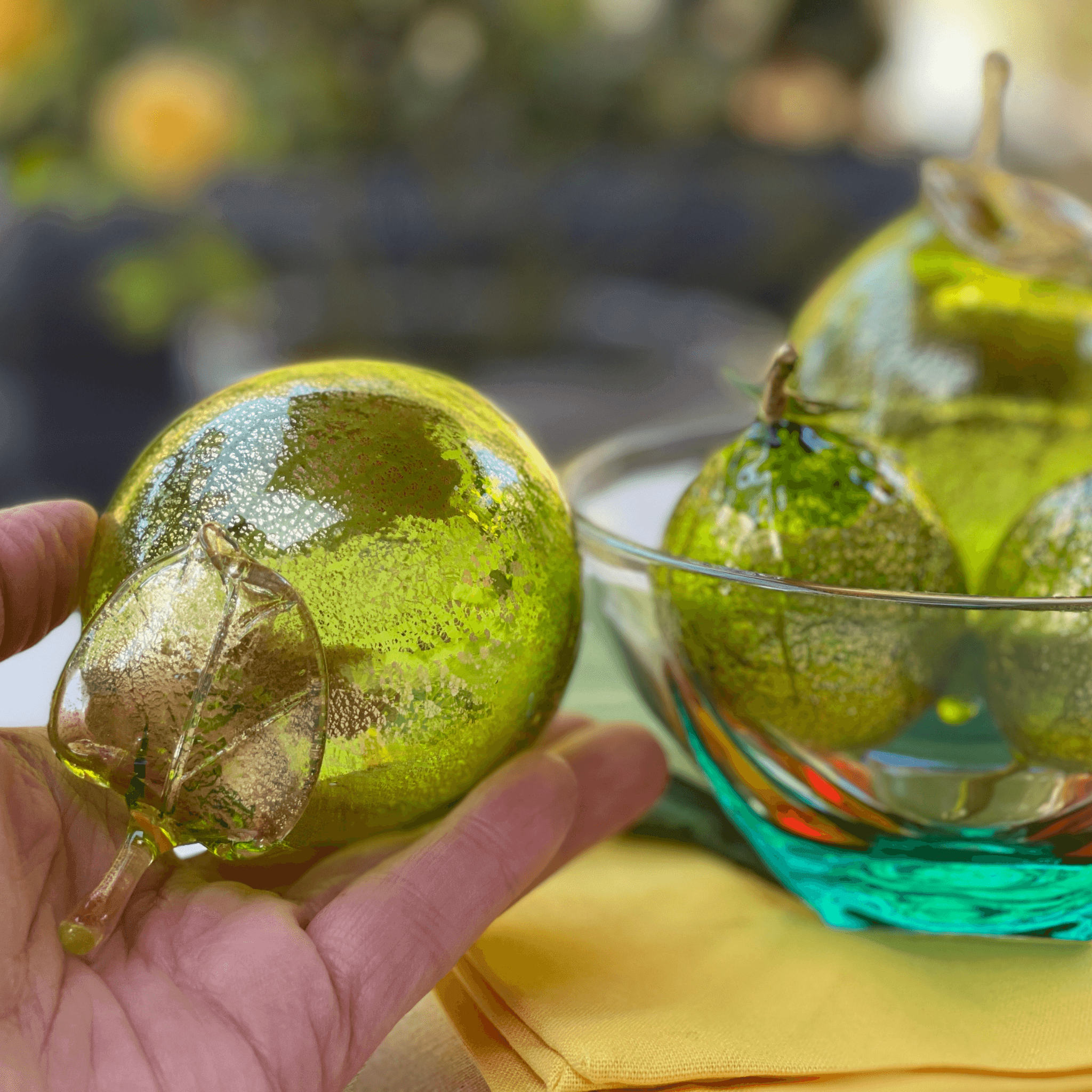 Life-size Murano glass limes in a bowl, handcrafted blown glass fruit by MyItalianDecor, made in Italy, realistic artificial flora.