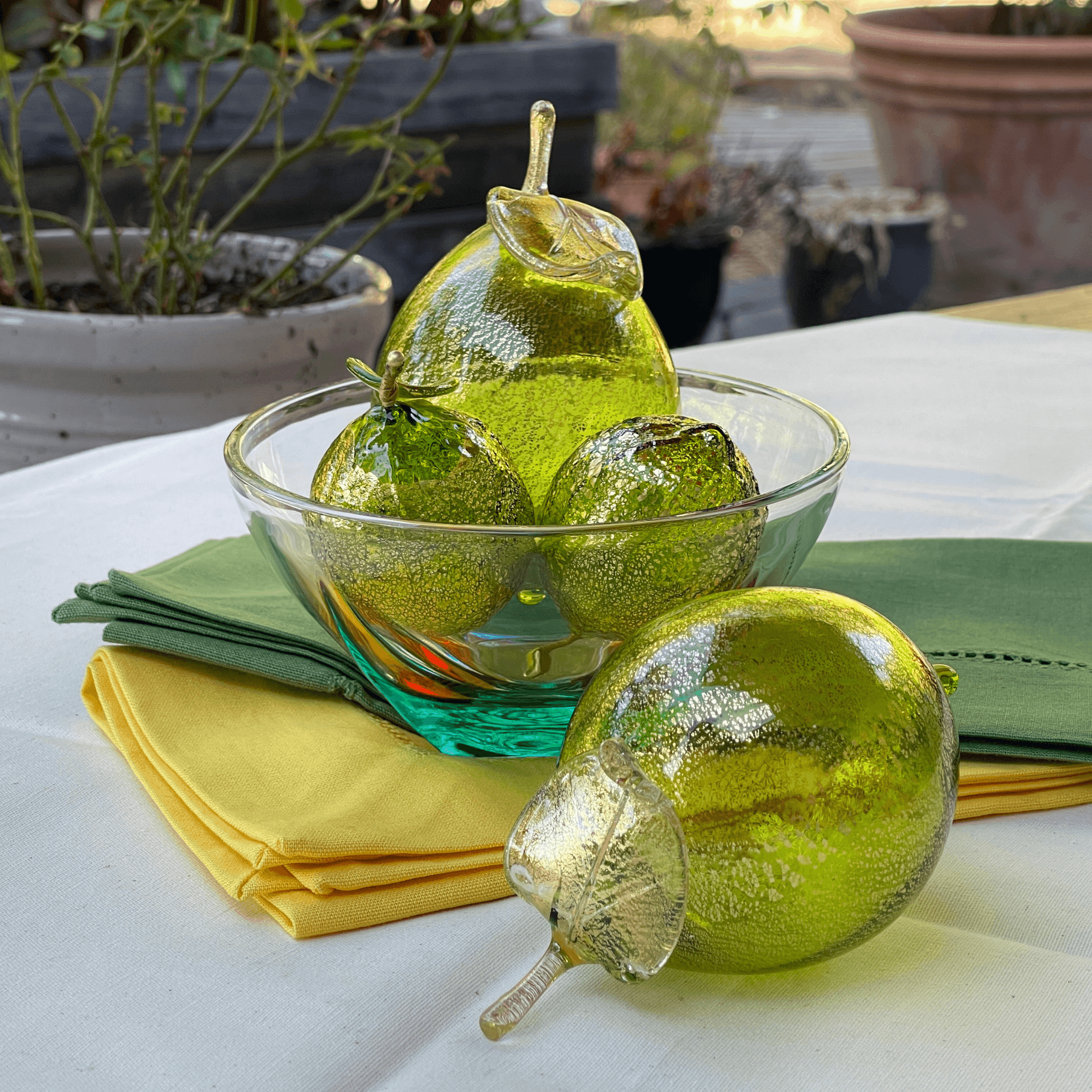 Life-size Murano glass limes in a bowl, handcrafted blown Italian artificial fruit by MyItalianDecor, vibrant and detailed.