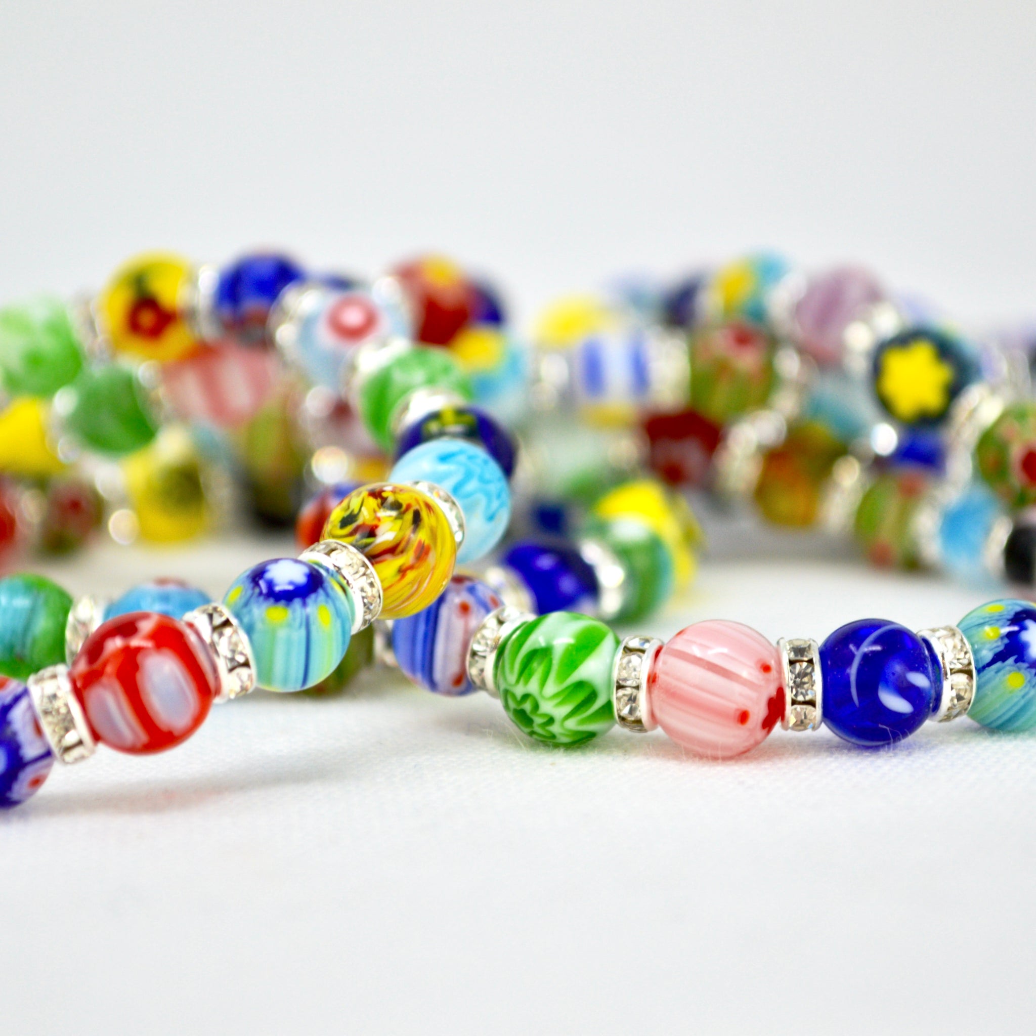 Colorful Murano Glass Millefiori Bead elastic bracelet with petite beads, handcrafted in Italy by MyItalianDecor.