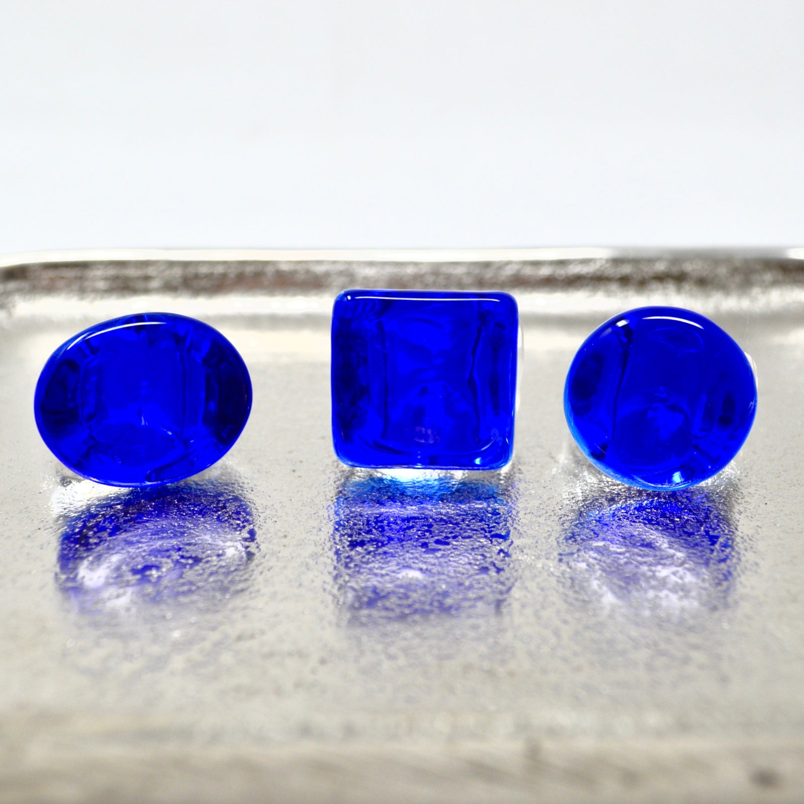 Cobalt Murano glass statement ring with intricate design, made in Italy, showcasing vibrant handcrafted craftsmanship.