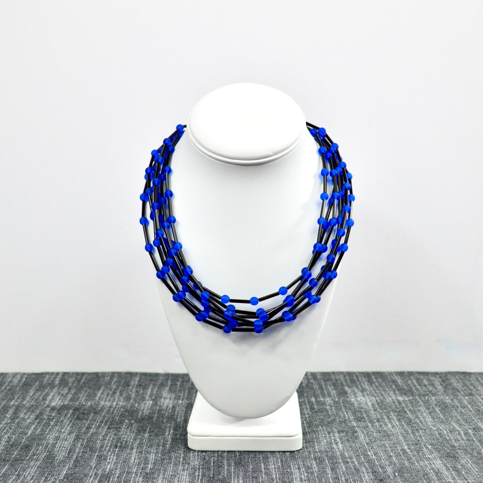 Handmade Murano Glass 'Serafina' beaded necklace in black and white, featuring colorful glass beads, crafted in Italy.