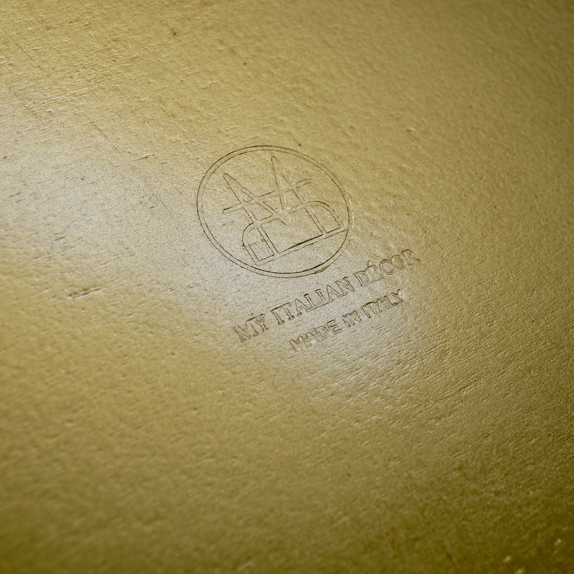 Decorative Florentine carved gilded wood circle tray with intricate patterns, made in Italy, by My Italian Decor.