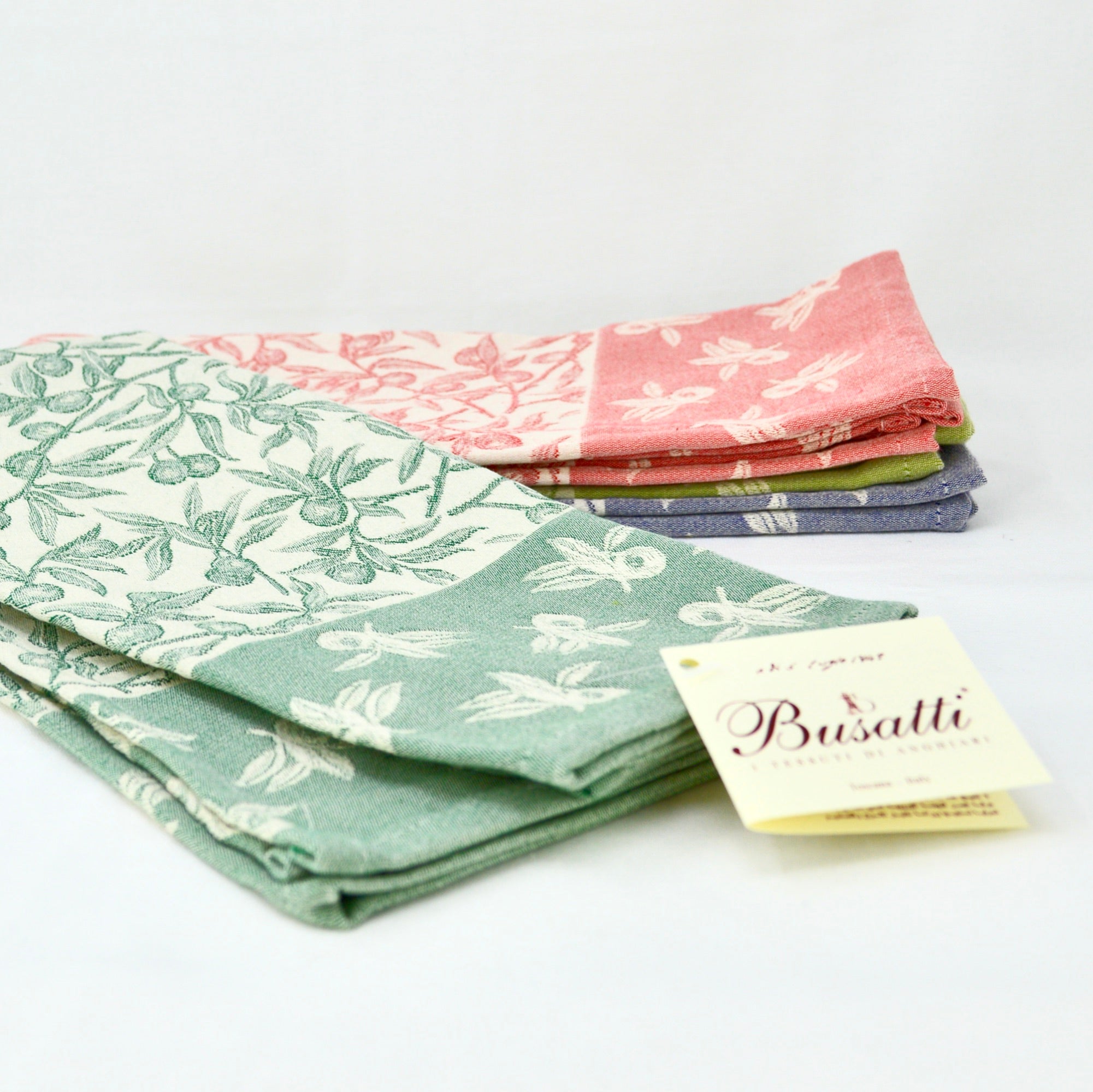 Olive green Busatti Oliva kitchen towel made in Italy, featuring vibrant assorted colors, ideal for kitchen and table linens.