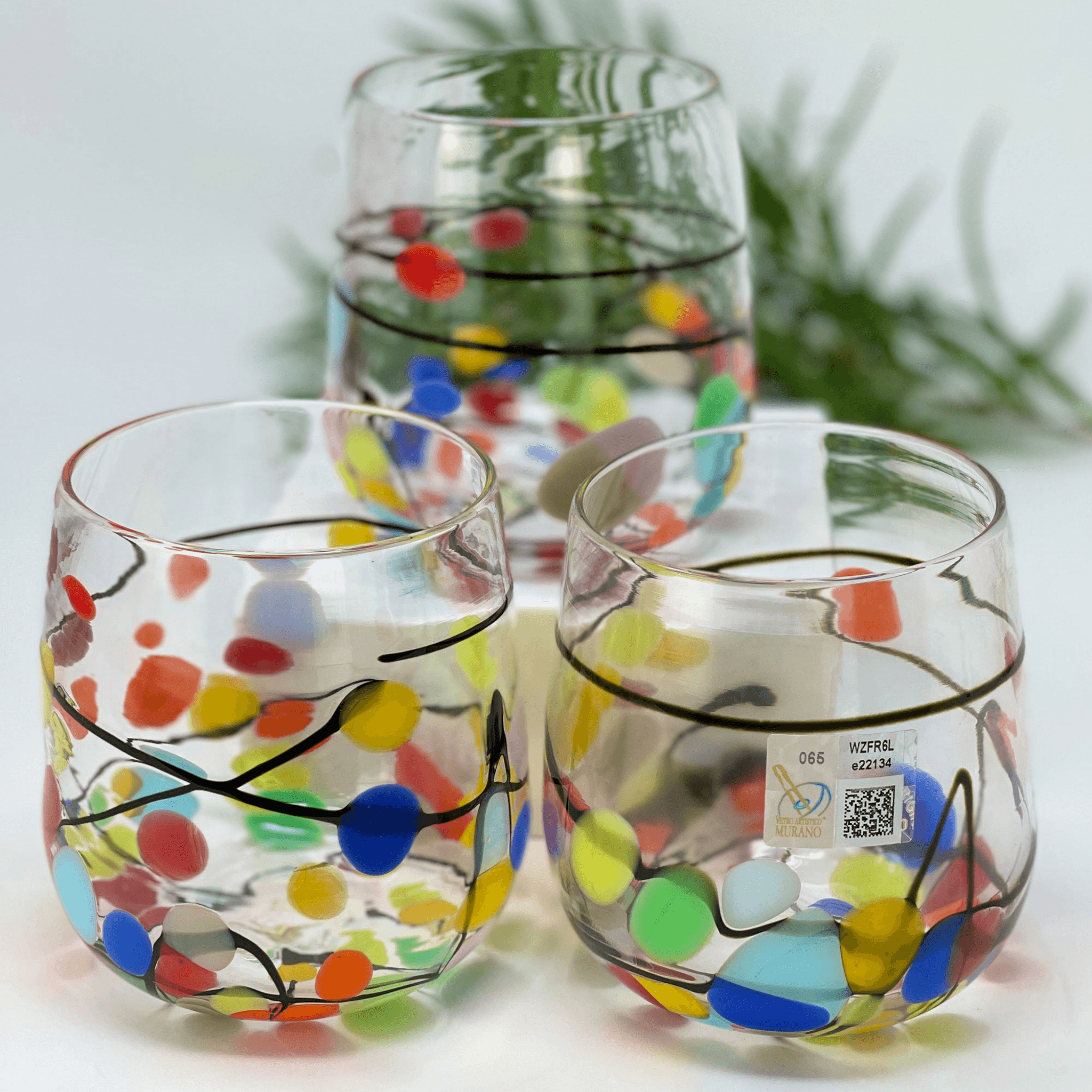 https://myitaliandecor.com/cdn/shop/products/picasso-stemless-wine-glasses_2048x.png?v=1660341461