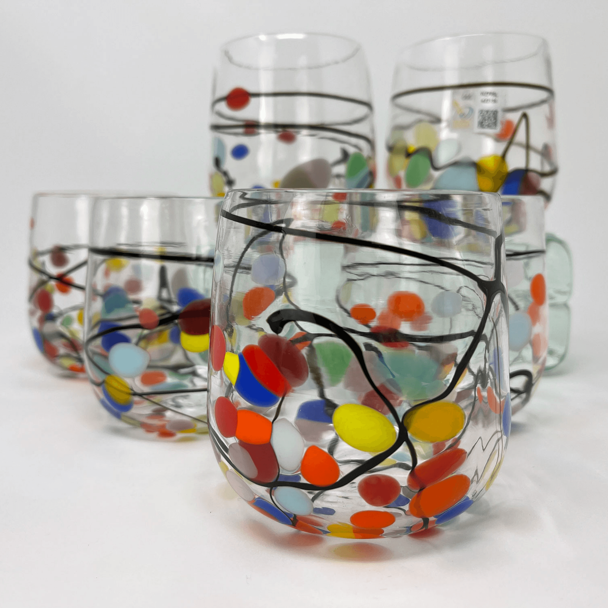 https://myitaliandecor.com/cdn/shop/products/picasso-stemless-wine-murano-italy-glasses_2048x.png?v=1660341472