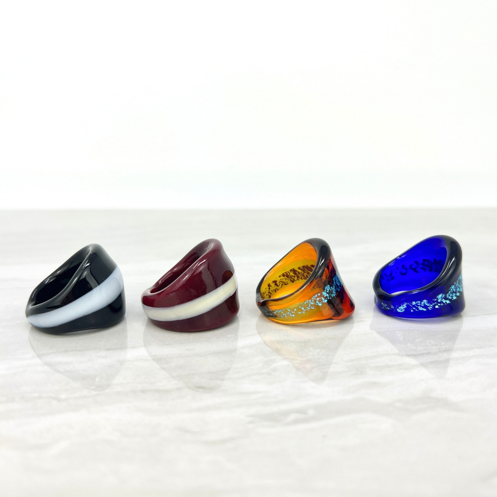 Colorful Murano glass stripe statement rings with bold designs, crafted in Italy by MyItalianDecor.
