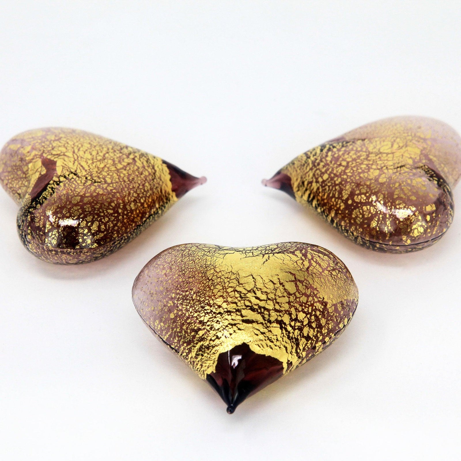 Set of three small Murano glass heart figurines in various colors, handcrafted in Italy by MyItalianDecor.